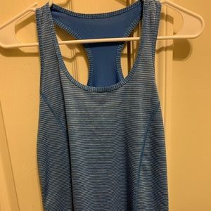 Bundle of 3 racer back tank tops(2 small&1 medium)
